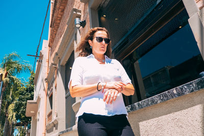 Portrait of a businesswoman walking in a hurry on the street