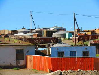 Houses against blue sky