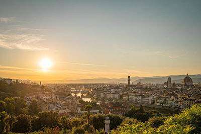 High angle view of townscape against sky during sunset