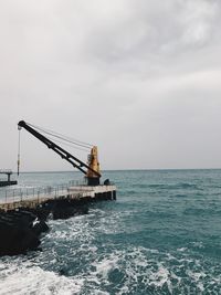 Ship in sea against sky
