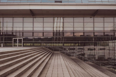 Staircase by building in city