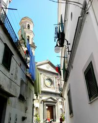 Low angle view of clock tower against sky