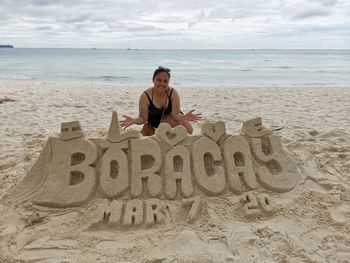 Full length portrait of man on beach