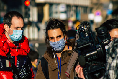 Portrait of friends standing outdoors