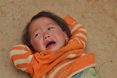 Portrait of cute baby lying down