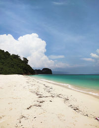 Scenic view of beach against sky