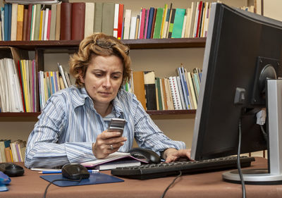 Woman working at desk in office
