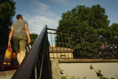 Railing against sky