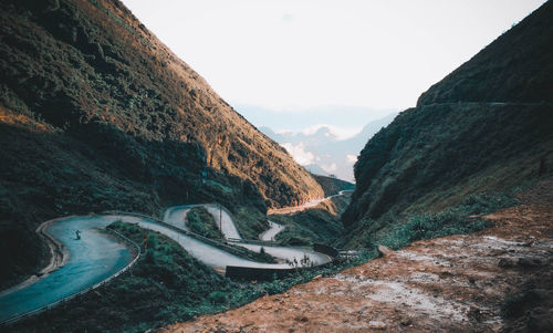 Scenic view of mountain road against sky