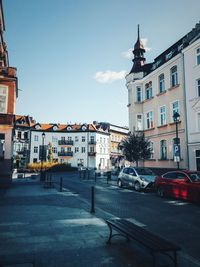 Buildings in city against sky