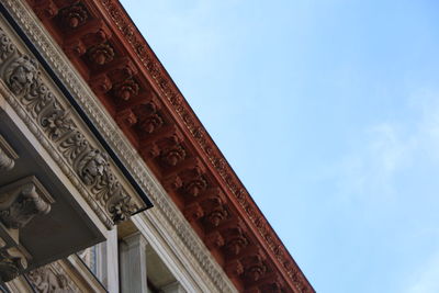 Low angle view of ornate building against sky