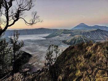 Scenic view of mountain against sky during sunset