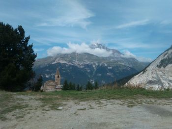 View of a temple with mountain range in the background