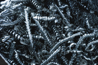 Turning waste. metal shavings close up. steel spirals. industrial background. grunge
