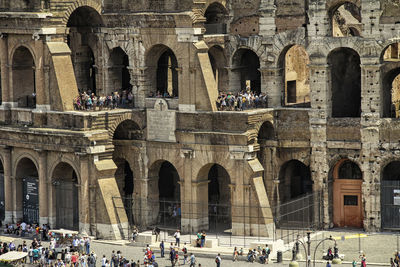 People in front of historical building