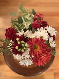 High angle view of flowering plant in vase on table
