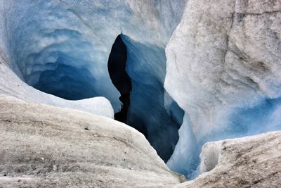 Rock formations in sea during winter