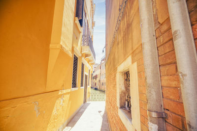 Low angle view of clothes hanging on wall