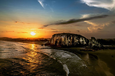 Scenic view of sea against sky during sunset