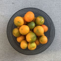 High angle view of fruits in plate on table