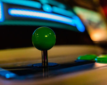 Close-up of illuminated ball on table