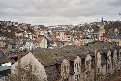 Aerial view of townscape against sky