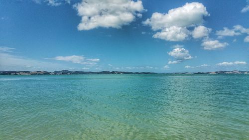 Scenic view of sea against blue sky