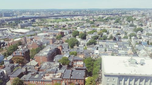 Aerial view of cityscape against clear sky