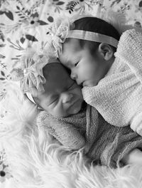 Newborn twin girls, black and white