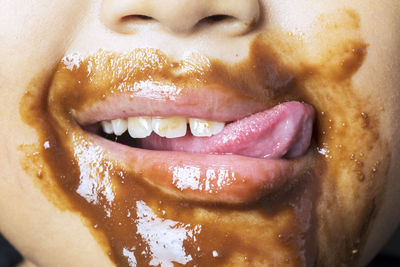 Close-up of woman with ice cream
