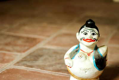 Close-up of sculpture on table