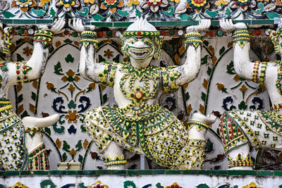 Beautiful detailed sculptures, decorations on the temple of dawn, wat arun buddhist temple