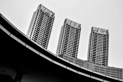 Low angle view of modern buildings against clear sky