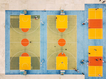 Aerial view of people at basketball courts