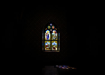 Illuminated window in temple