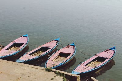 High angle view of boats moored on river