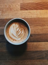 Close-up of cappuccino on table