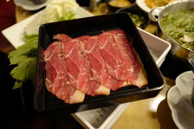 Close-up of meat on barbecue grill