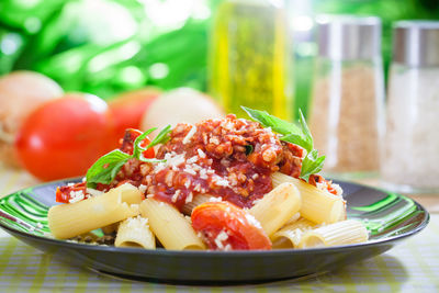 Close-up of fruits in plate on table