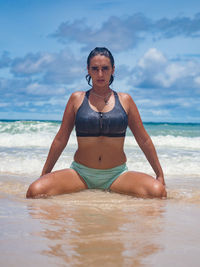 Portrait of young woman on beach