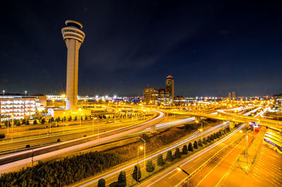 High angle view of light trails on road at night