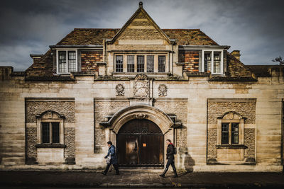 Facade of historic building against sky