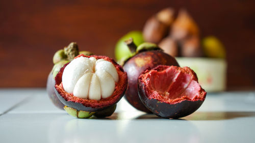 Close-up of fruits in plate on table