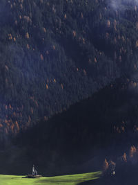 High angle view of church against mountains 