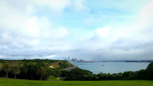 Scenic view of landscape against cloudy sky