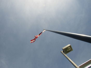 Low angle view of flag against sky