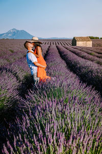 View of purple flowering plants on field