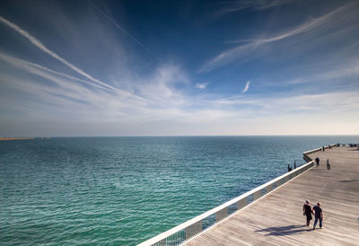 High angle view of pier on sea against sky 