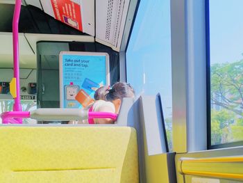 Woman sitting in train