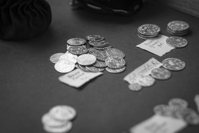 High angle view of coins on table